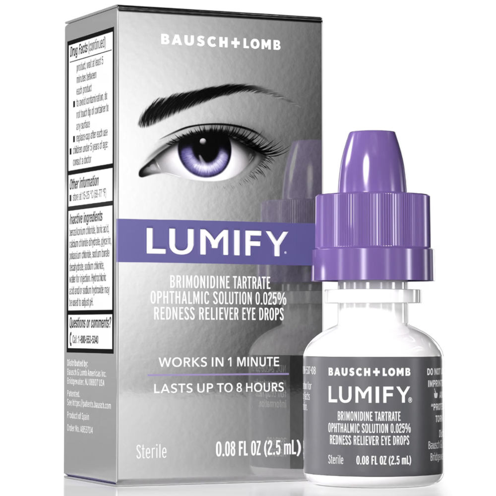 Lumify Redness Reliever Eye Drops 2.5ml shown with its retail box and the dropper bottle. The packaging features theBausch + Lomb logo, a metallic silver design with a graphic of a purple eye, and the bottle has a purple cap and a black label.